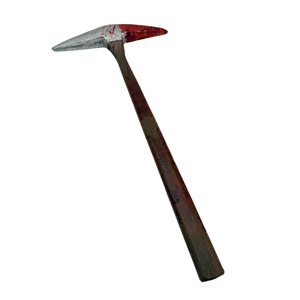 A pickhead axe with a weathered silver head splattered with red blood, and a dark brown wooden handle, isolated on a white background.