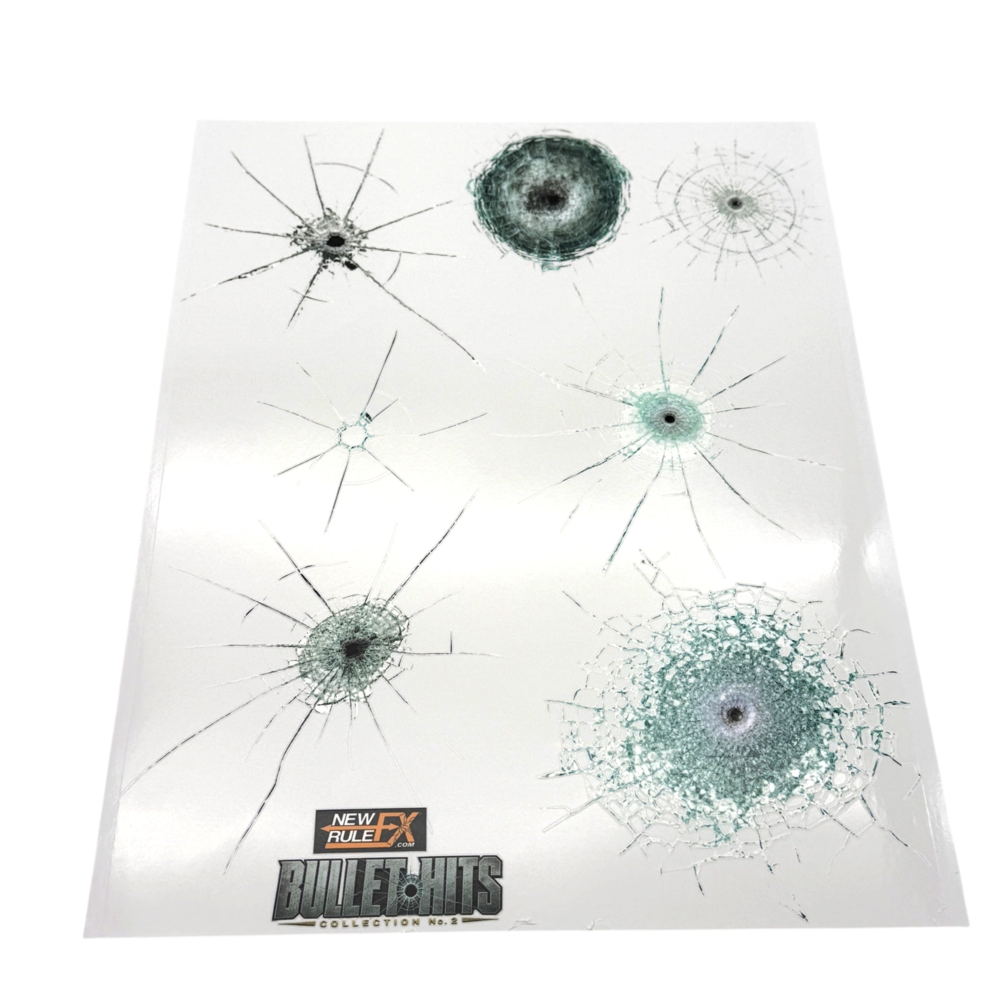 NewRuleFX Glass Hits Collection 2 sheet with seven glass bullet-impact decals in varied crack and shatter patterns.