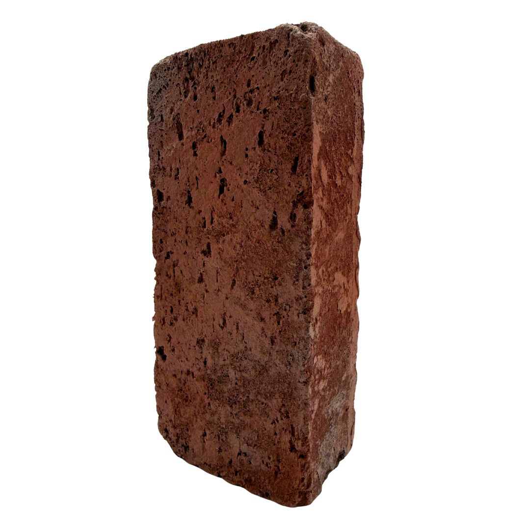 A single rectangular red clay brick with a rough, porous texture, isolated on a white background.