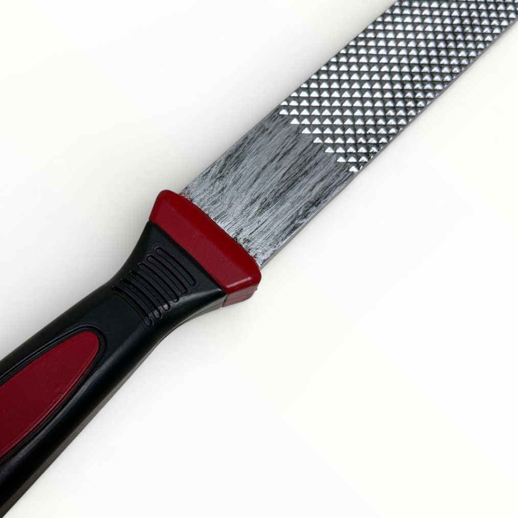 Metal file with red and black handle on a white background