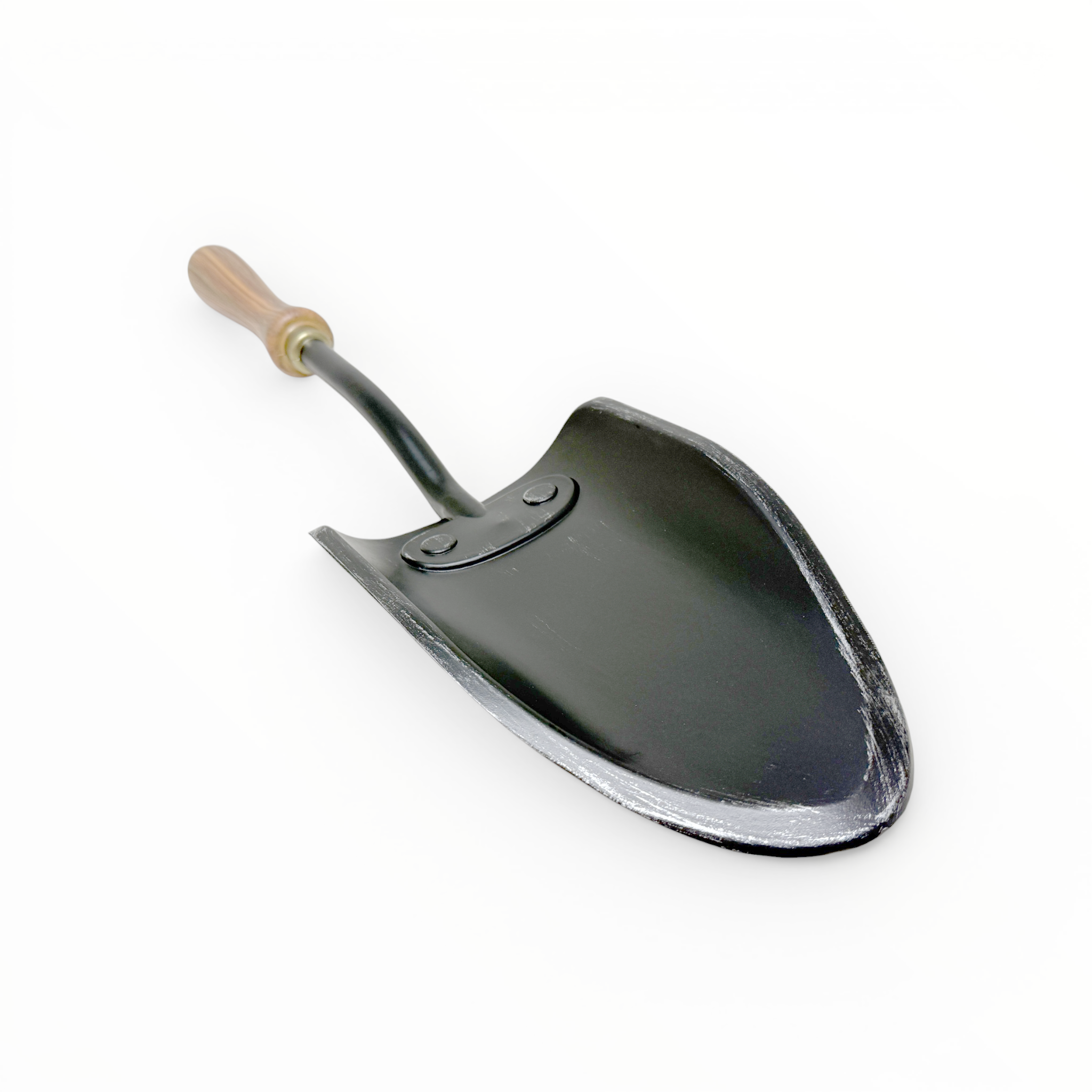 Metal shovel with a wooden handle on a white background