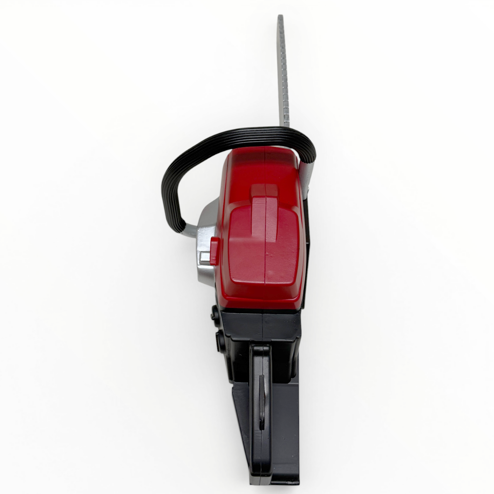 Red and black chainsaw on a white background