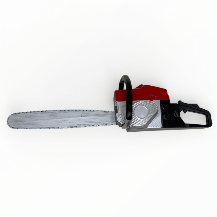 Toy chainsaw on a white background