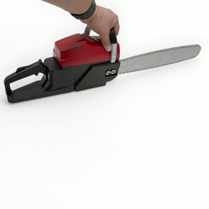 Handheld chainsaw with a red engine cover on a white background