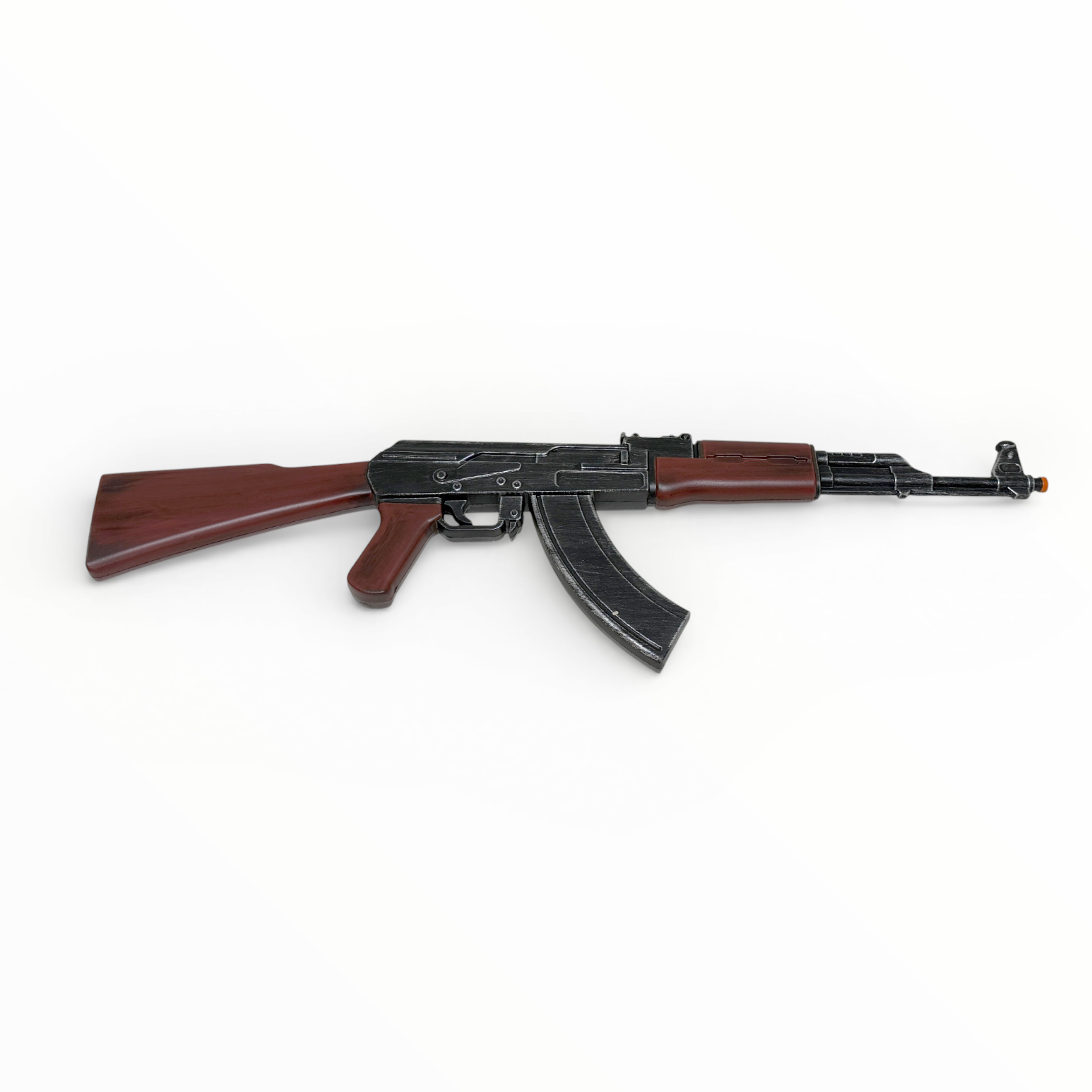 Toy rifle with wooden stock on a white background