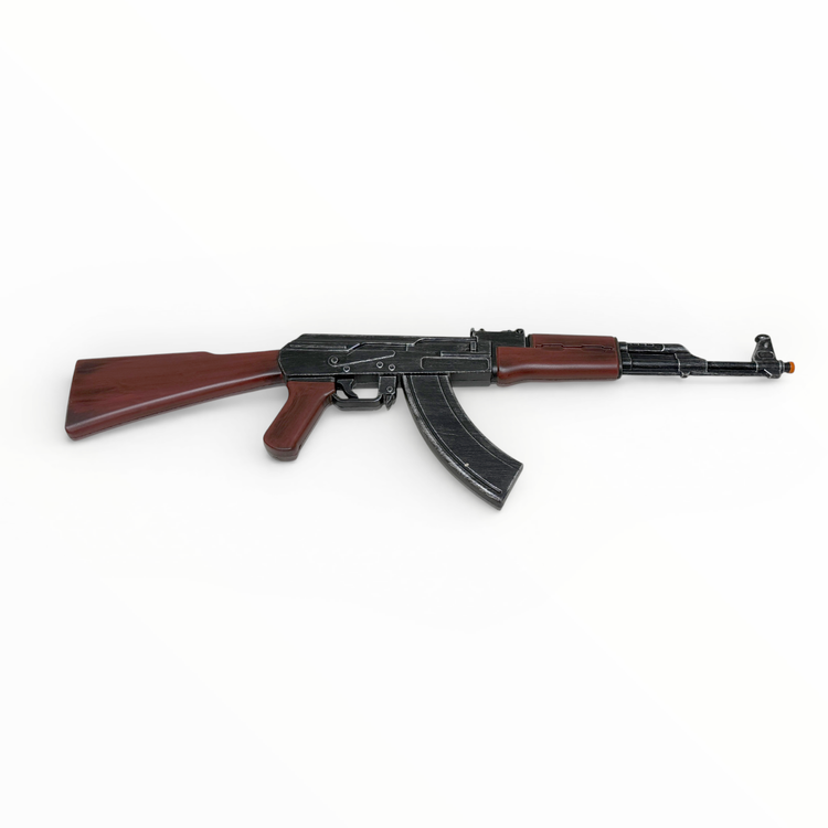 Toy rifle with wooden stock on a white background