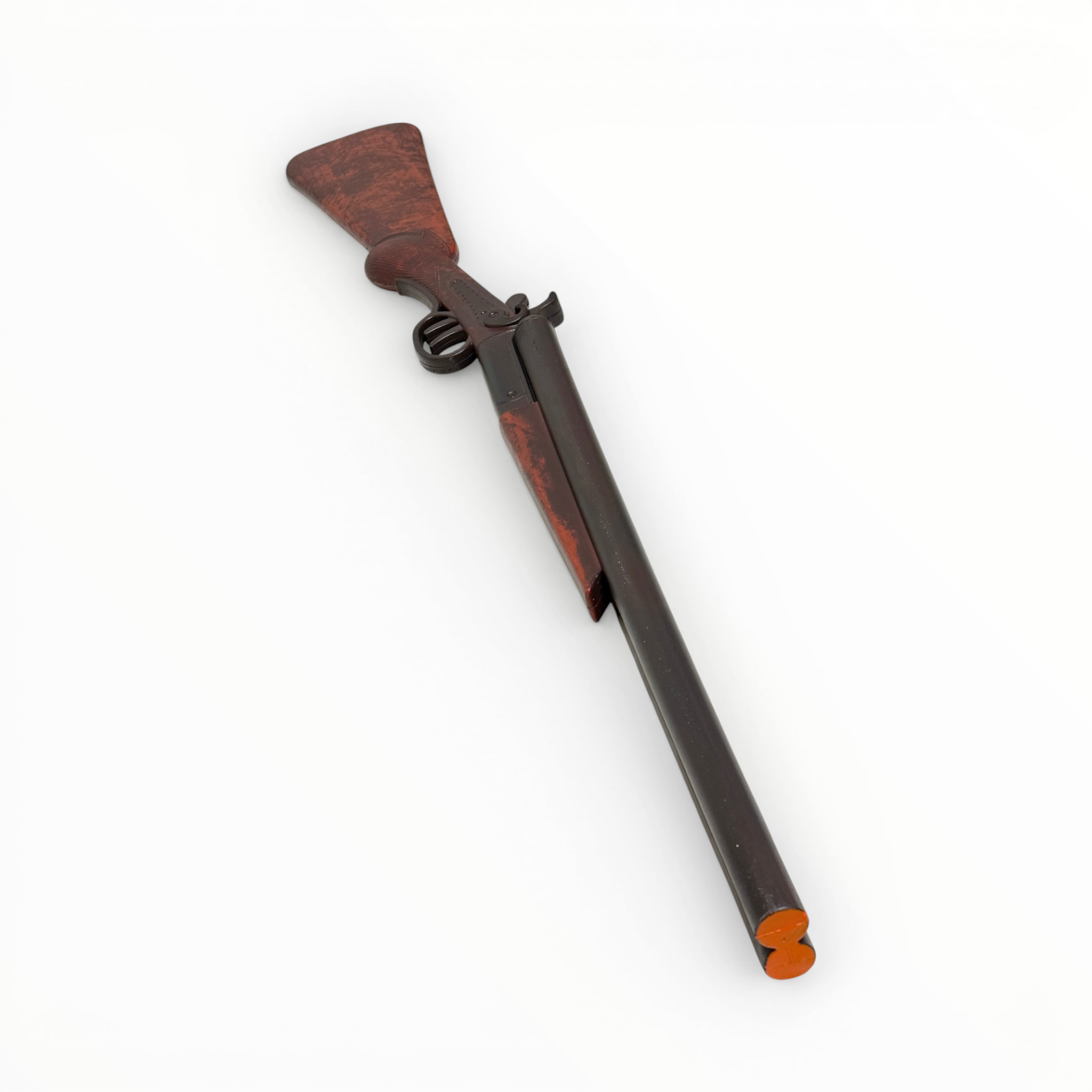 Toy gun with wooden stock and metal barrel on a white background
