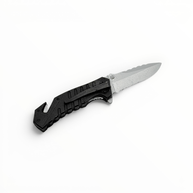 Folding knife with black handle on a white background