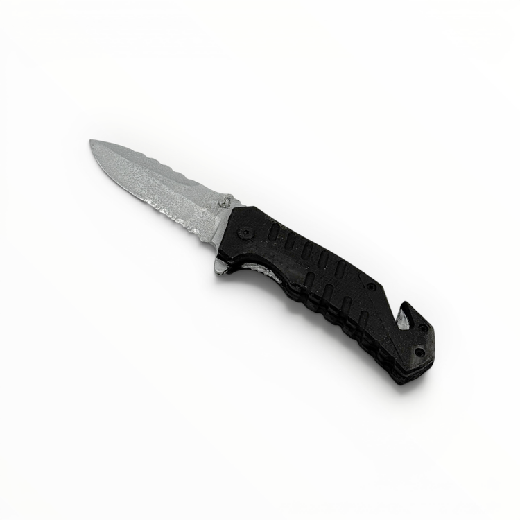 Black and silver foam knife on a white background