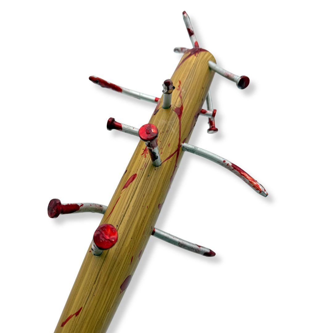 Close up Baseball bat with bloody nails sticking out