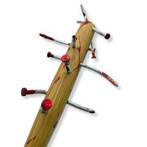 Close up Baseball bat with bloody nails sticking out