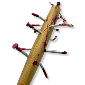 Close up Baseball bat with bloody nails sticking out