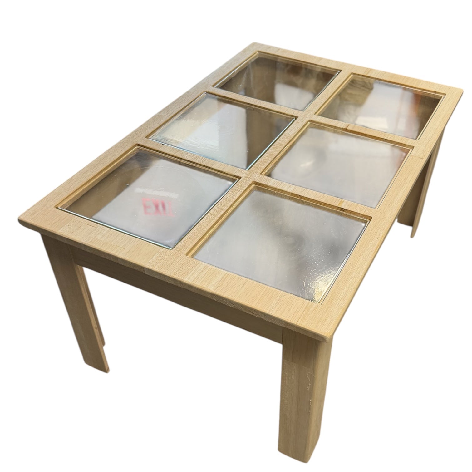 Balsa Wood and Glass Breakaway Coffee Table Smashable Stunt Prop featuring a light wood frame with six glass insets, designed for film and theater use.