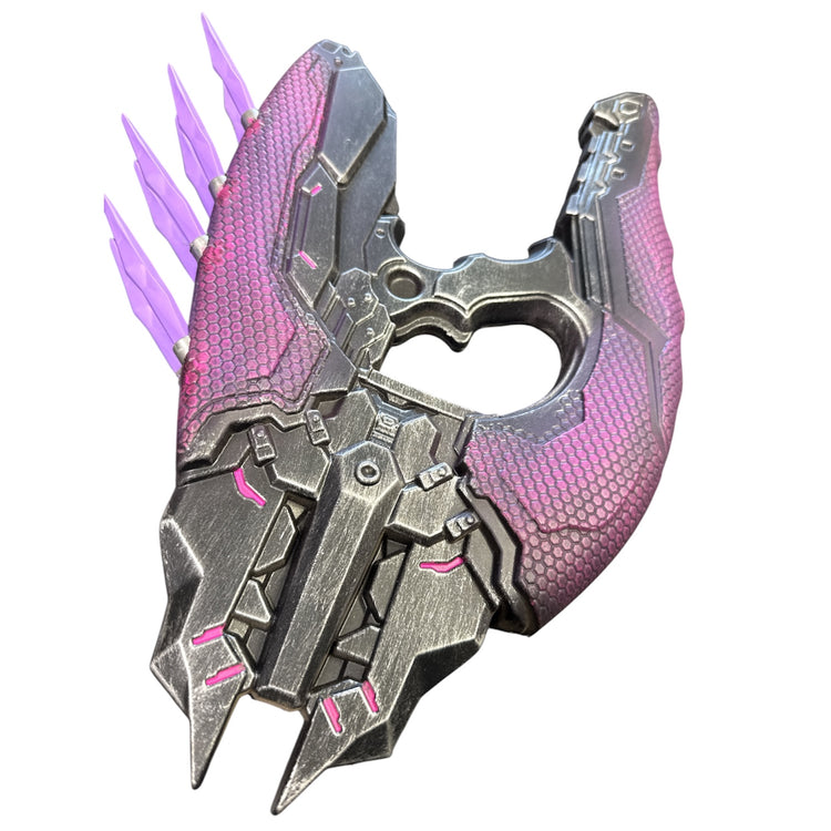 Rubber Halo Needler Prop, a sci-fi style decorative gauntlet with honeycomb-textured panels and translucent prongs, perfect for cosplay or special effects.