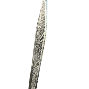 Close-up of the Foam Spawn Sword Prop, showcasing its intricately patterned steel blade, designed for realistic special effects in film and theater productions.