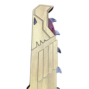Foam Warhammer Chainsword Imperial Golden Eagle Prop featuring a stylized dragon head with a blue eye, red detail, and silver tooth-like protrusions.