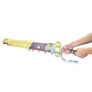 A person holds the Foam Warhammer Chainsword Imperial Golden Eagle Prop, featuring a gold, winged design, saw-tooth notches, and a mechanical hilt.