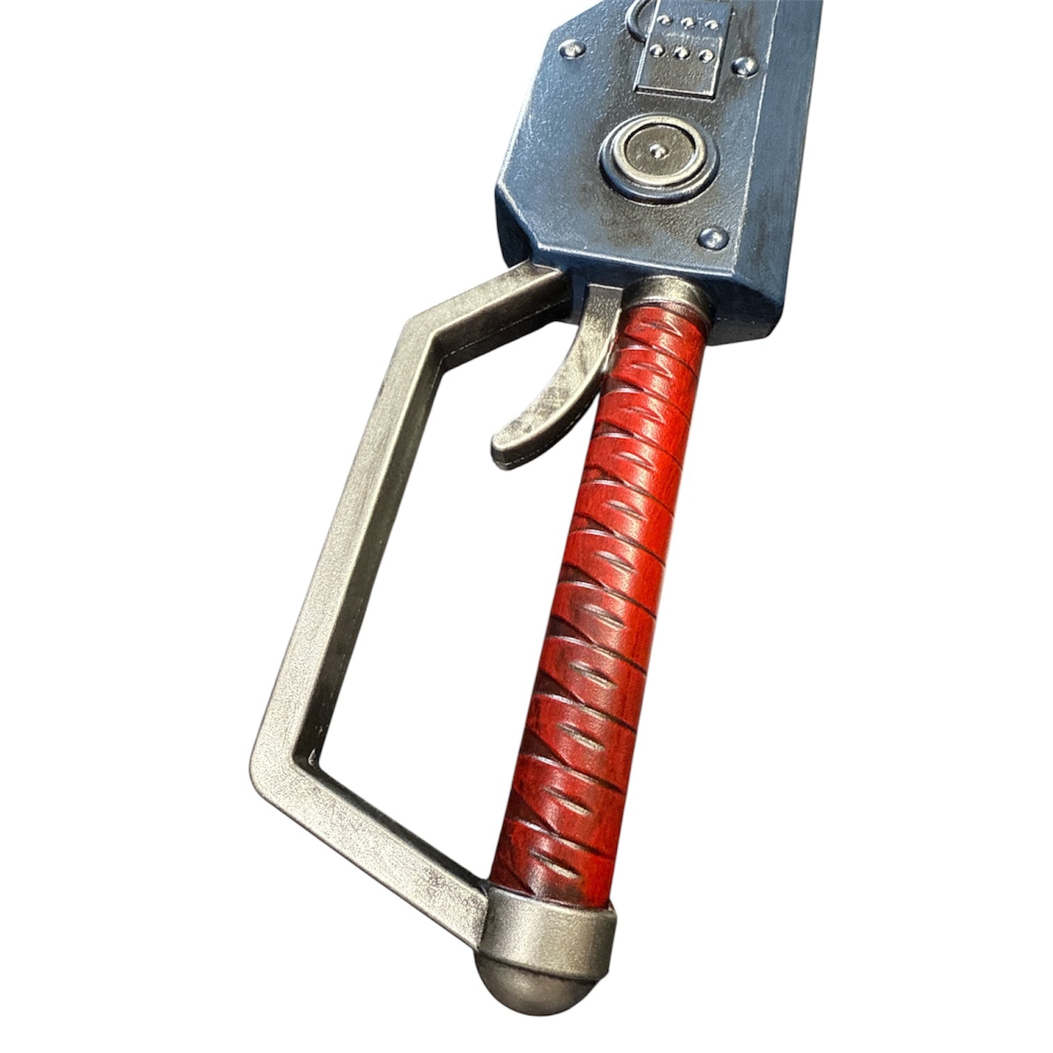 Foam Astartes Chainsword Prop with a red leather-wrapped grip, metal guard, and trigger lever, showcasing a detailed handle assembly for cosplay or prop use.