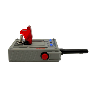 A handheld electronic device with a gray plastic housing, a red transparent cover, a red side button, blue indicator lights, and a black antenna, shown on a plain white background.