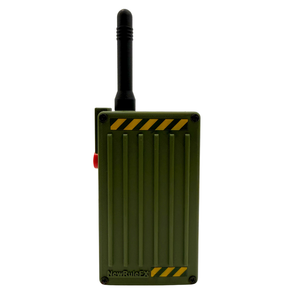 An olive green rectangular electronic device with a black antenna, featuring yellow hazard stripes and a red side button, on a plain white background.