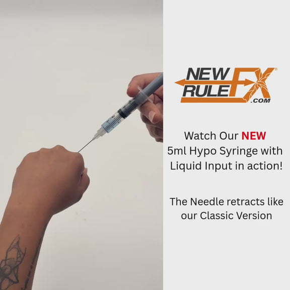 Video of hand using fake syringe to simulate fake injection