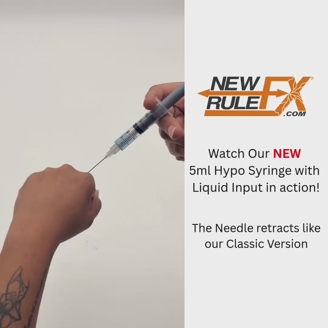 Video of hand using fake syringe to simulate fake injection